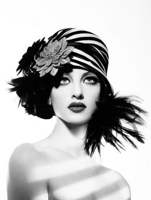 a glamorous life luscious - girl in 1920s style hat.jpg